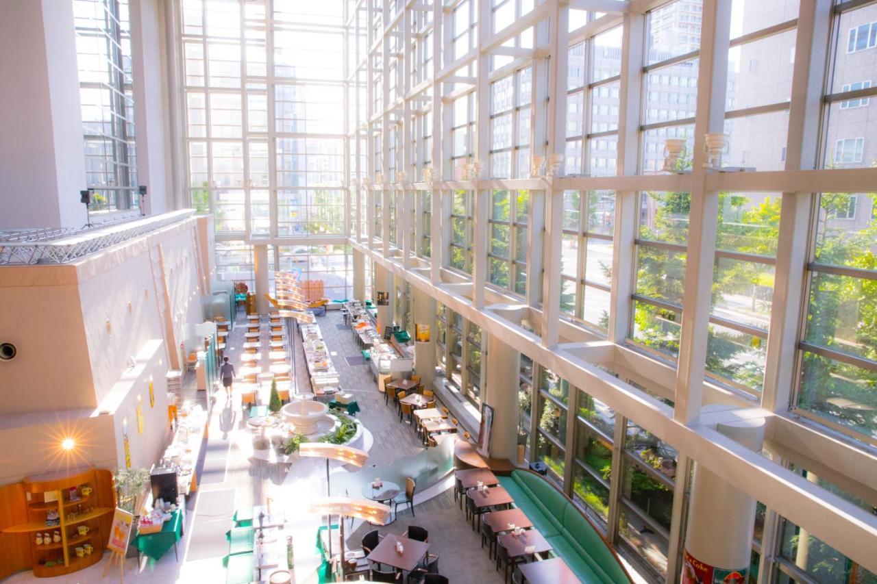 Royton Sapporo Hotel Kültér fotó The interior of the library